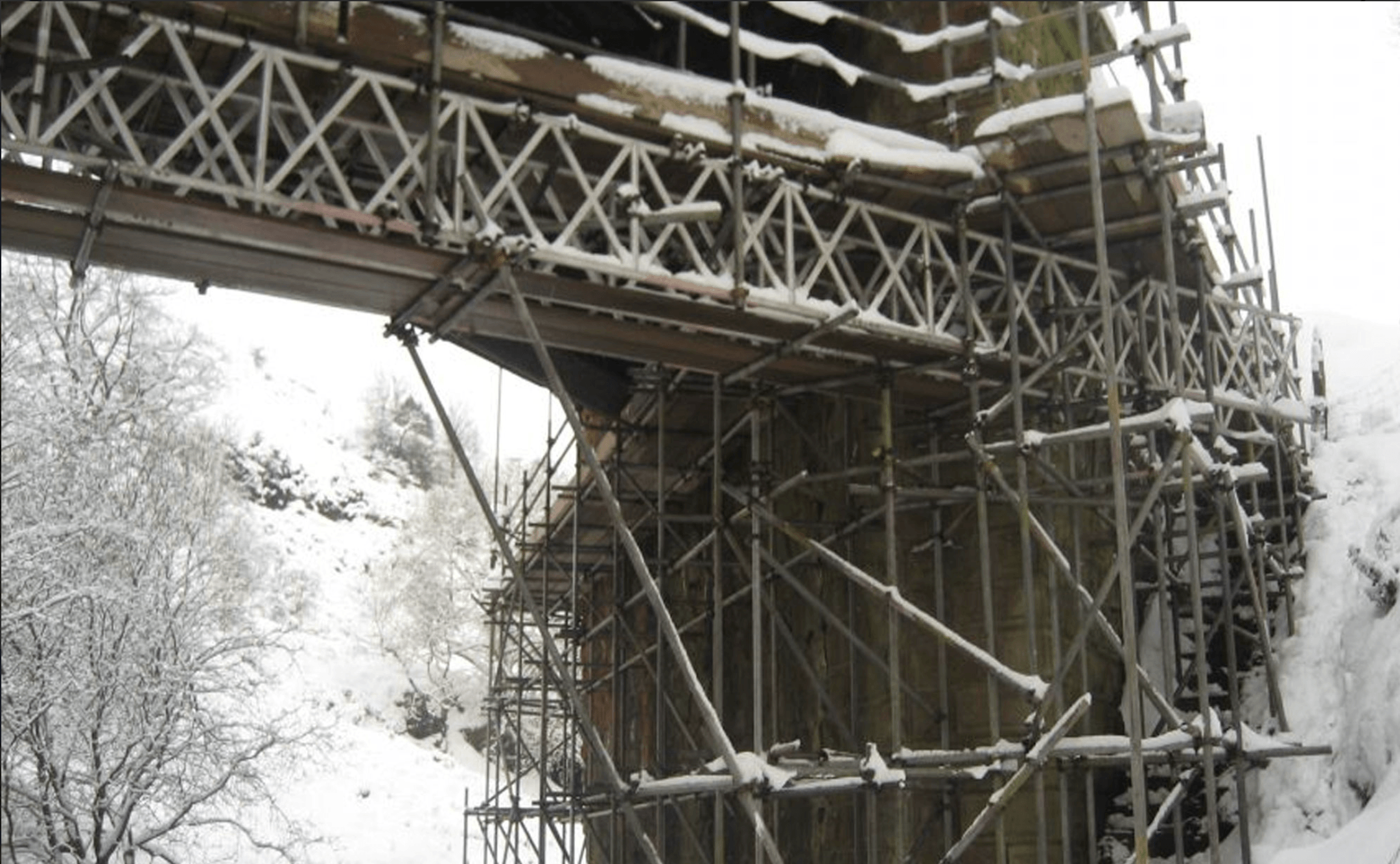 Engineered bridge scaffold spanning a gap