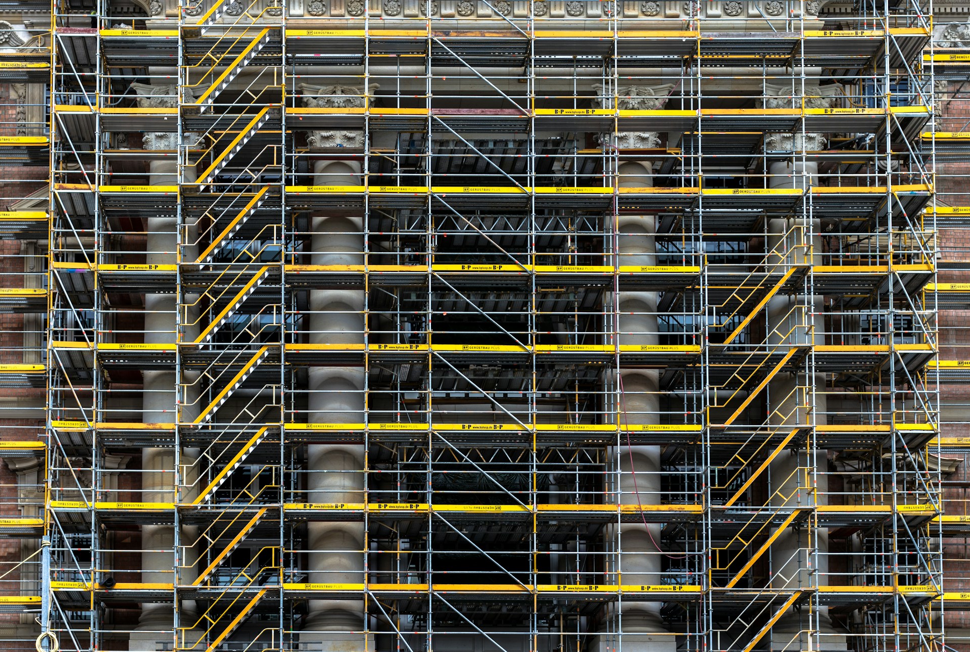 Complex scaffold around an ornate tower