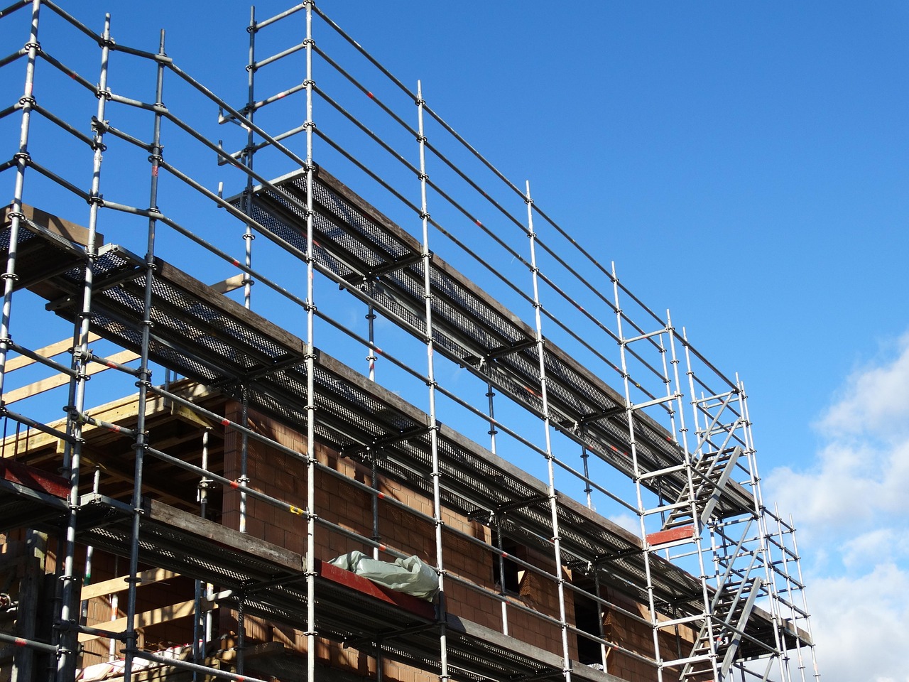 A domestic re-roof under safe scaffold access